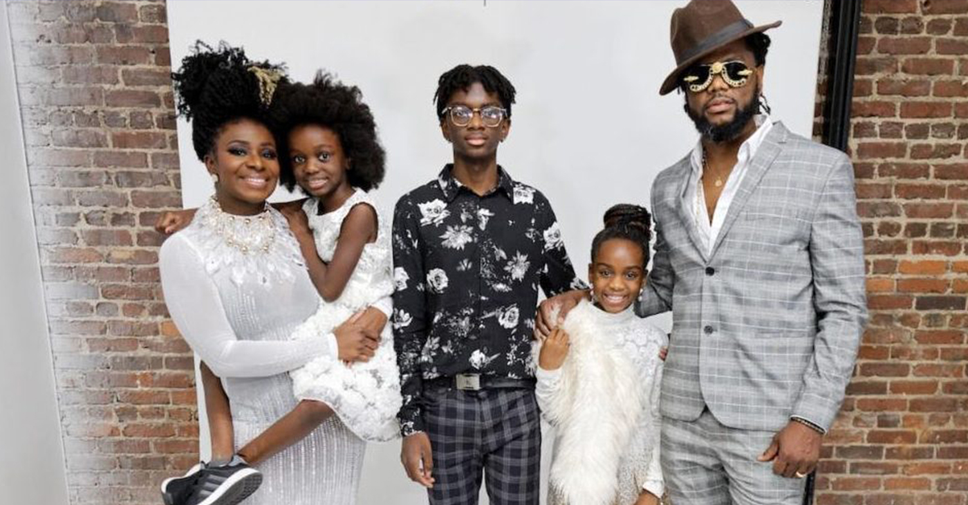 Mushiysa Tshikuka and Louis Smith posing with their children to celebrate the grand opening of Runway Curls Salon Suites (Photo by: Datrick Davis of DaeRaeMedia)