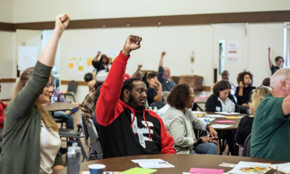 Community organizers and Oakland residents gathered for a Town Hall in West Oakland, demanding a community benefits agreement from the A’s. (Photo by: Saskia Hatvany)