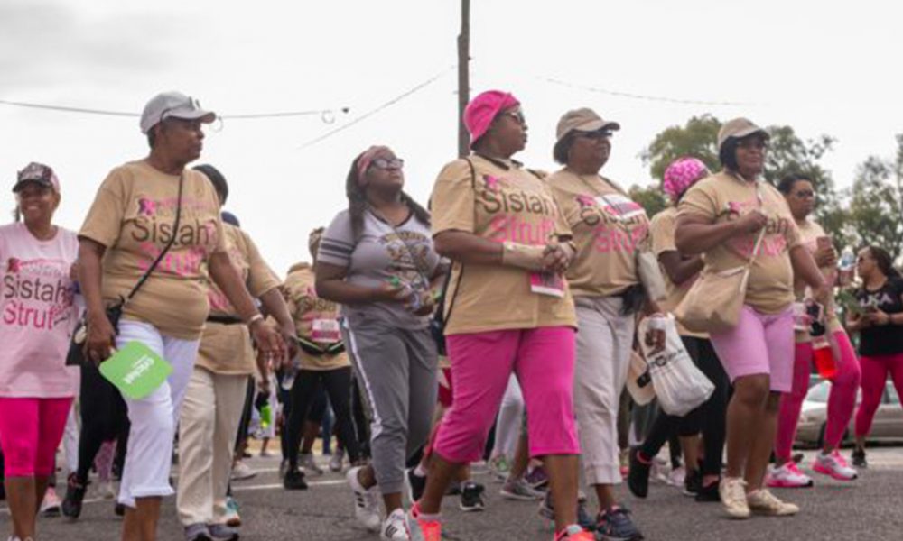 Attendees begin during Sistah Strut, the 2019 Brenda's Brown Bosom Buddies Breast Cancer Awareness Walk outside Legion Field. (Photo by: Amarr Croskey, For The Birmingham Times)