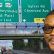 Tyler Perry in front of a sign directing motorists to his studios near downtown Atlanta (Image source: Instagram – @tylerperry)