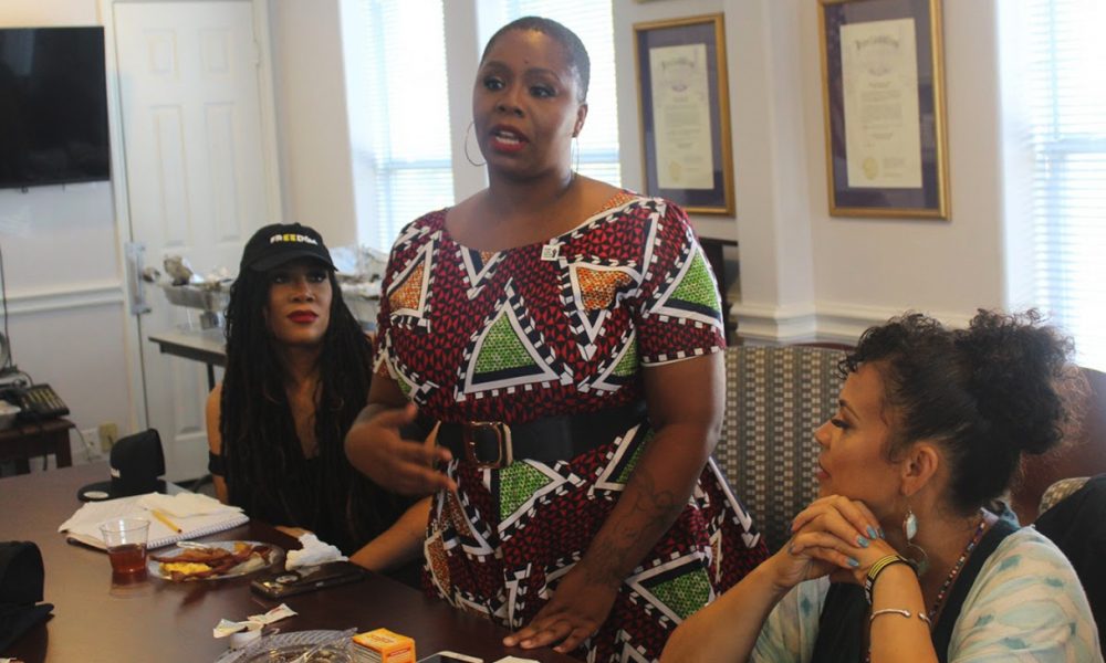 BLM co-founder Patrisse Cullors (standing) announcing new 'What Matters 2020' initiative while in Houston for the Democratic Party debate.