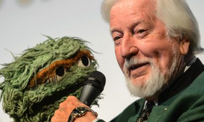 Oscar the Grouch (left) and Carol Spinney (Photo by Neil Grabowsky / Wikimedia Commons)