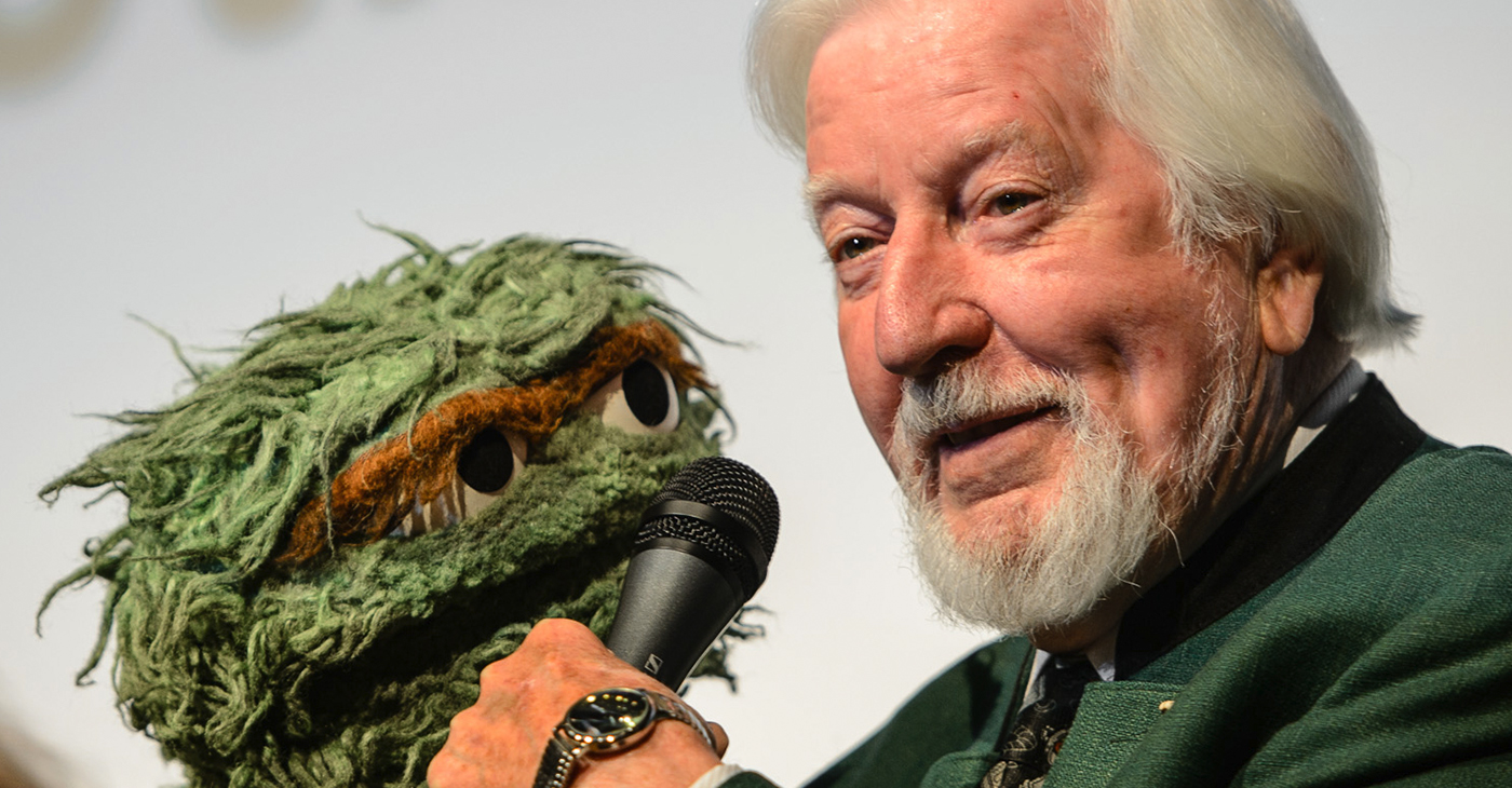 Oscar the Grouch (left) and Carol Spinney (Photo by Neil Grabowsky / Wikimedia Commons)
