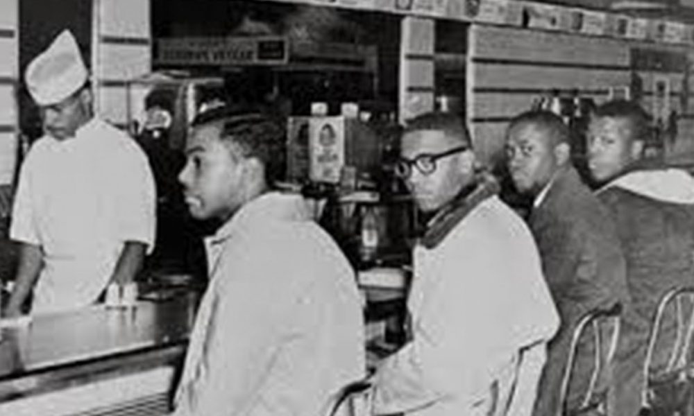 Students from Norfolk’s Booker T. Washington High School stage set in at Granby Street’s Woolworth’s lunch counter. Photo: New Journal and Guide Archives