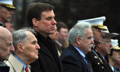 Sen. Mark Warner of Va. (3rd from L) joined World War II veterans at the U.S. Marine Corps Memorial in Arlington, Va., on Tues., Feb. 23, 2010, to commemorate the 65th anniversary of the raising of the U.S. flag at Iwo Jima. The Senator's father, Robert Warner of Vernon, CT, (2nd from L) and James L. Wheeler of Falls Church, VA (far L) are both retired Marines who fought at Iwo Jima. (Photo by Riki Parikh/Sen. Warner’s Office)