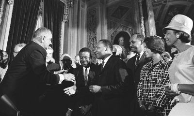 President Lyndon B. Johnson meets with Martin Luther King, Jr. at the signing of the Voting Rights Act of 1965. August 6, 1965. (Photo: Lyndon Baines Johnson Library and Museum / Wikimedia Commons)