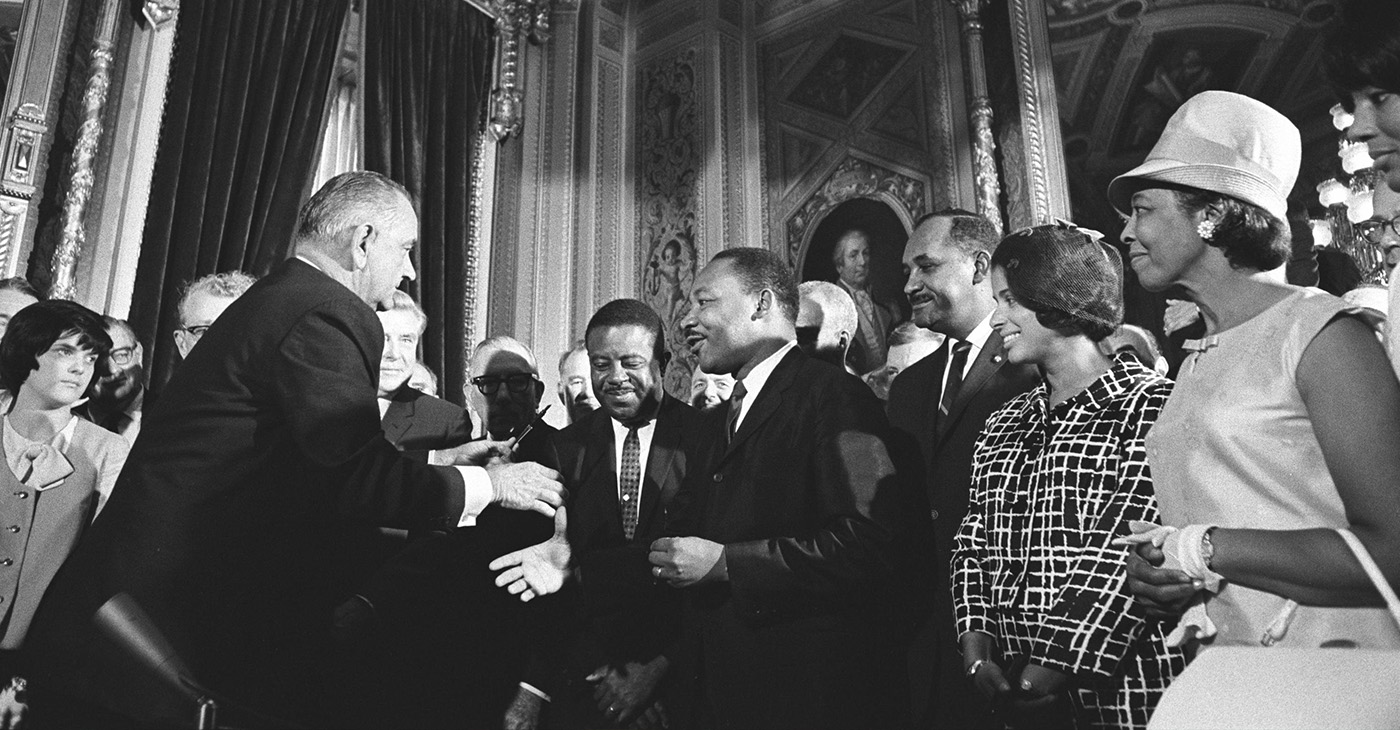 President Lyndon B. Johnson meets with Martin Luther King, Jr. at the signing of the Voting Rights Act of 1965. August 6, 1965. (Photo: Lyndon Baines Johnson Library and Museum / Wikimedia Commons)