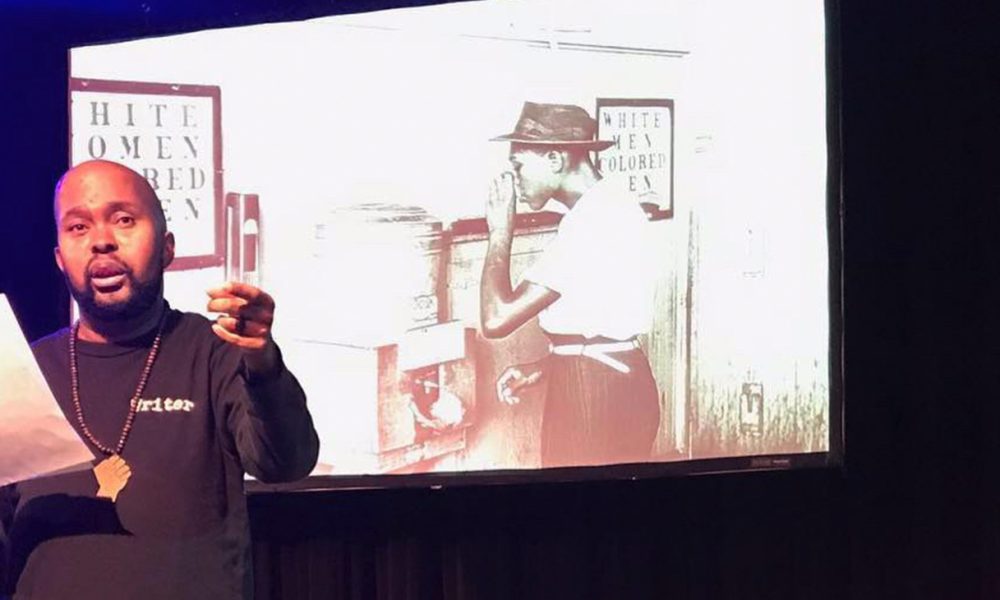 Donney Rose performs excerpts from "The American Audit." (Photo by Josh Hamzehee)