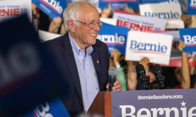 U.S. Senator en:Bernie Sanders smiling at a campaign rally on 1 March 2020. (Photo: Wikimedia Commons)