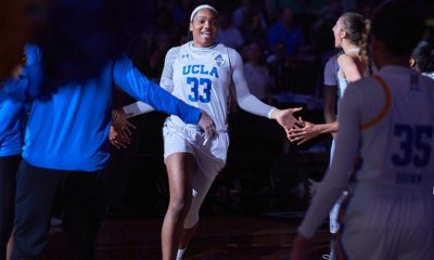 UCLA forward Lauryn Miller (33) runs onto the court after being announced at the Pac-12 Women’s Semifinals (Omer Khan/tgsportstv1)