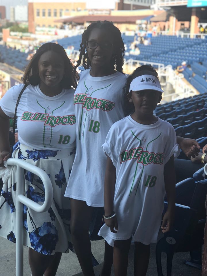 Paris (center) and her sisters, Talia (left) and Olivia (right).
