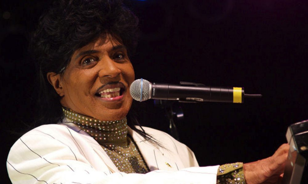 Little Richard’s high-energy performances while playing the piano included dancing on top of the piano, running on and off the stage and throwing souvenirs to the audience. He also dressed flamboyantly onstage. Some of what is taken for granted now in popular music was invented by Little Richard. (Photo: Little Richard performing at the University of Texas Forty Acres Festival in 2007. Wikimedia Commons / Anna Bleker)