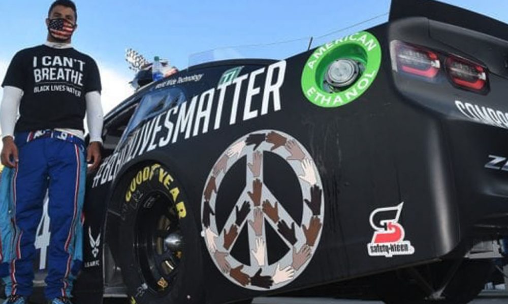 NASCAR driver Bubba Wallace stands on pit row at Matinsville (Photo: nascar.com)