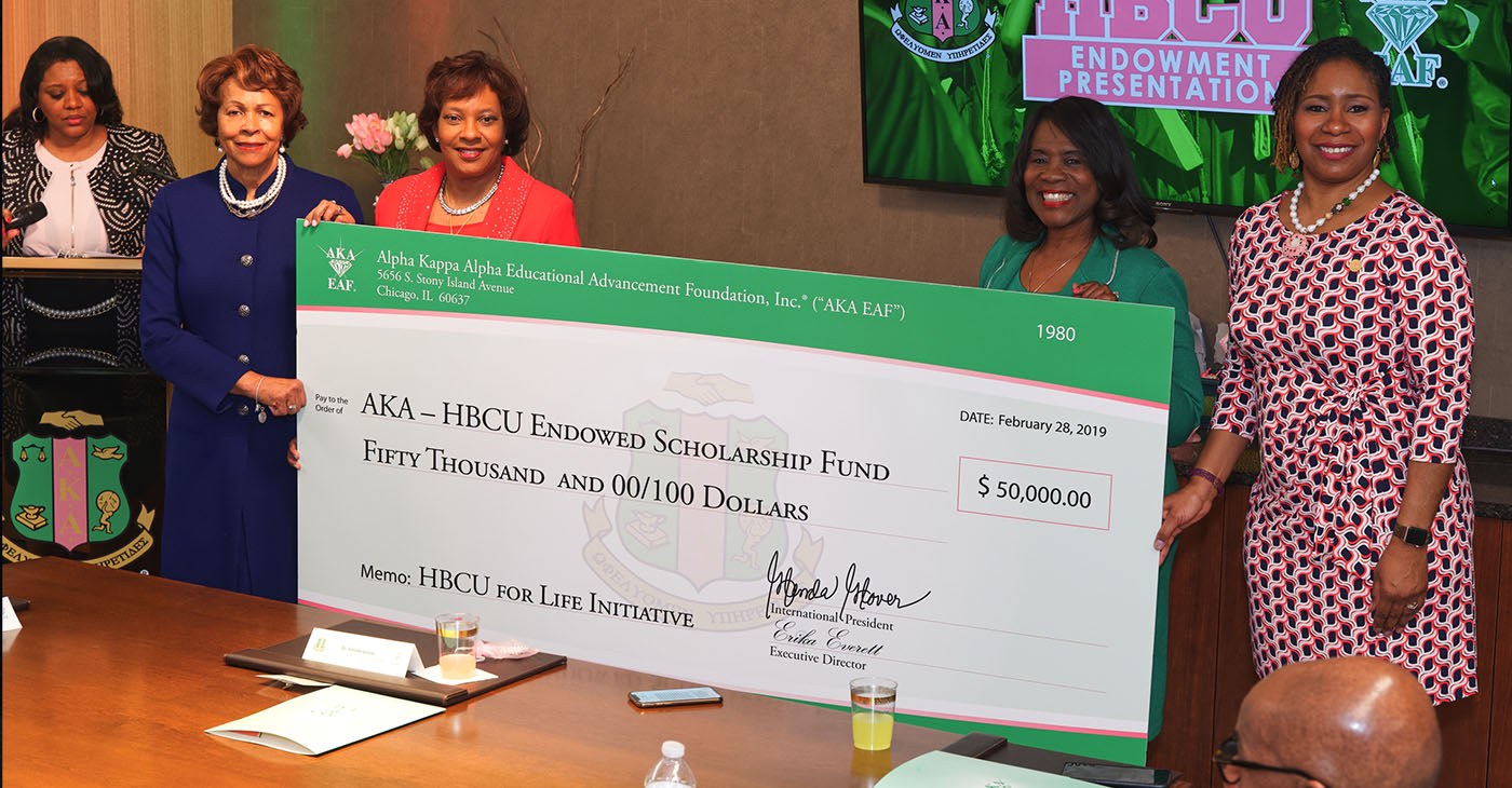 AKA International President and Chief Executive Officer, Dr. Glenda Glover (second from right) is joined by (l-r) former Bennett College President Dr. Phyllis Worthy Dawkins, Jennifer King Congleton, AKA Mid Atlantic Regional Director and Erika Everett, Executive Director, Education Advancement Foundation at Alpha Kappa Alpha International Headquarters in Chicago for grant presentations to 32 HBCUs during Black History Month in 2019.