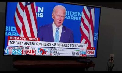 Joe Biden speaking at a podium, possibly during a press conference or rally.
