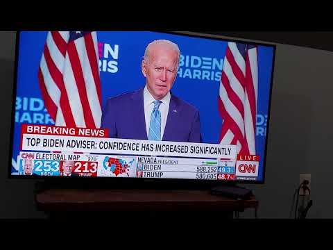 Joe Biden speaking at a podium, possibly during a press conference or rally.