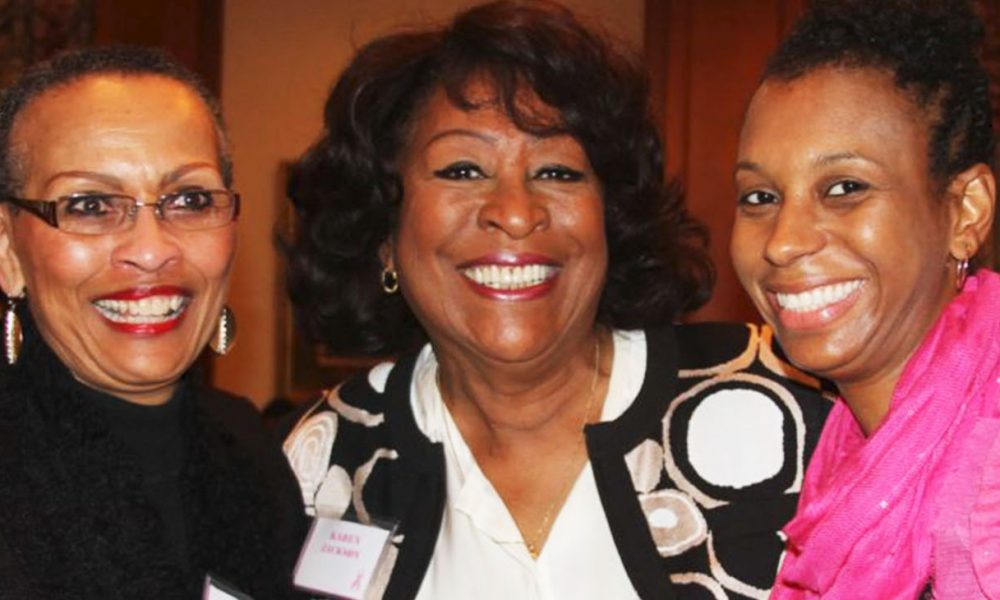 Sisters Network Inc. Founder and CEO Karen Jackson (center) greets Greensboro members Jeannette McCall (left) and Rokisha Rover-Simrel (right) in Durham, N.C.