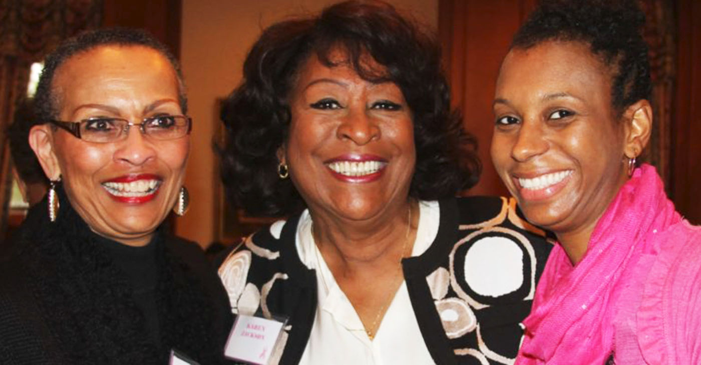 Sisters Network Inc. Founder and CEO Karen Jackson (center) greets Greensboro members Jeannette McCall (left) and Rokisha Rover-Simrel (right) in Durham, N.C.