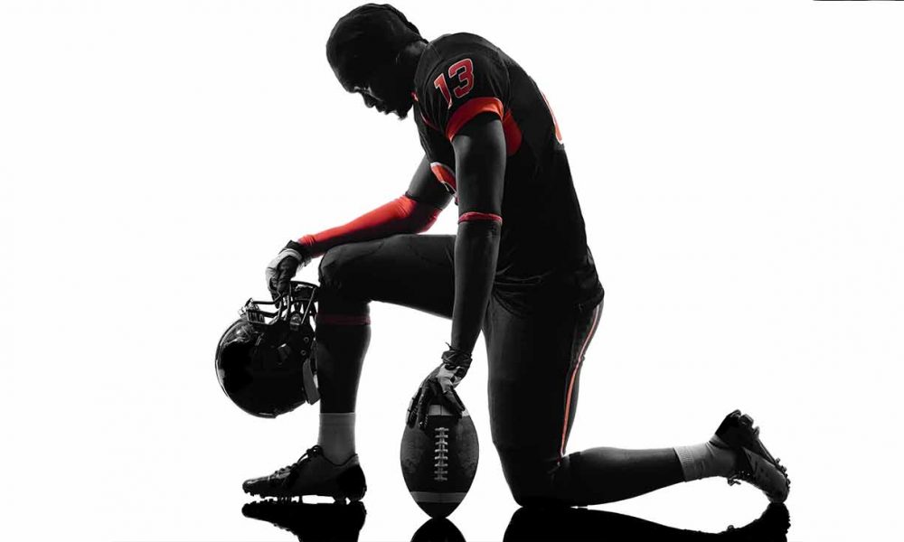 Today, nearly 70% of NFL players are African American but there are no African American NFL owners. (Photo: iStockphoto / NNPA)