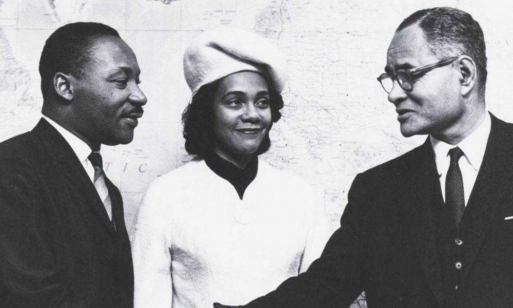 Dr. Ralph J. Bunche (far right) greets Rev. Dr. Martin Luther King Jr. (left) and Coretta Scott King (center). (Photo: ucla.edu)