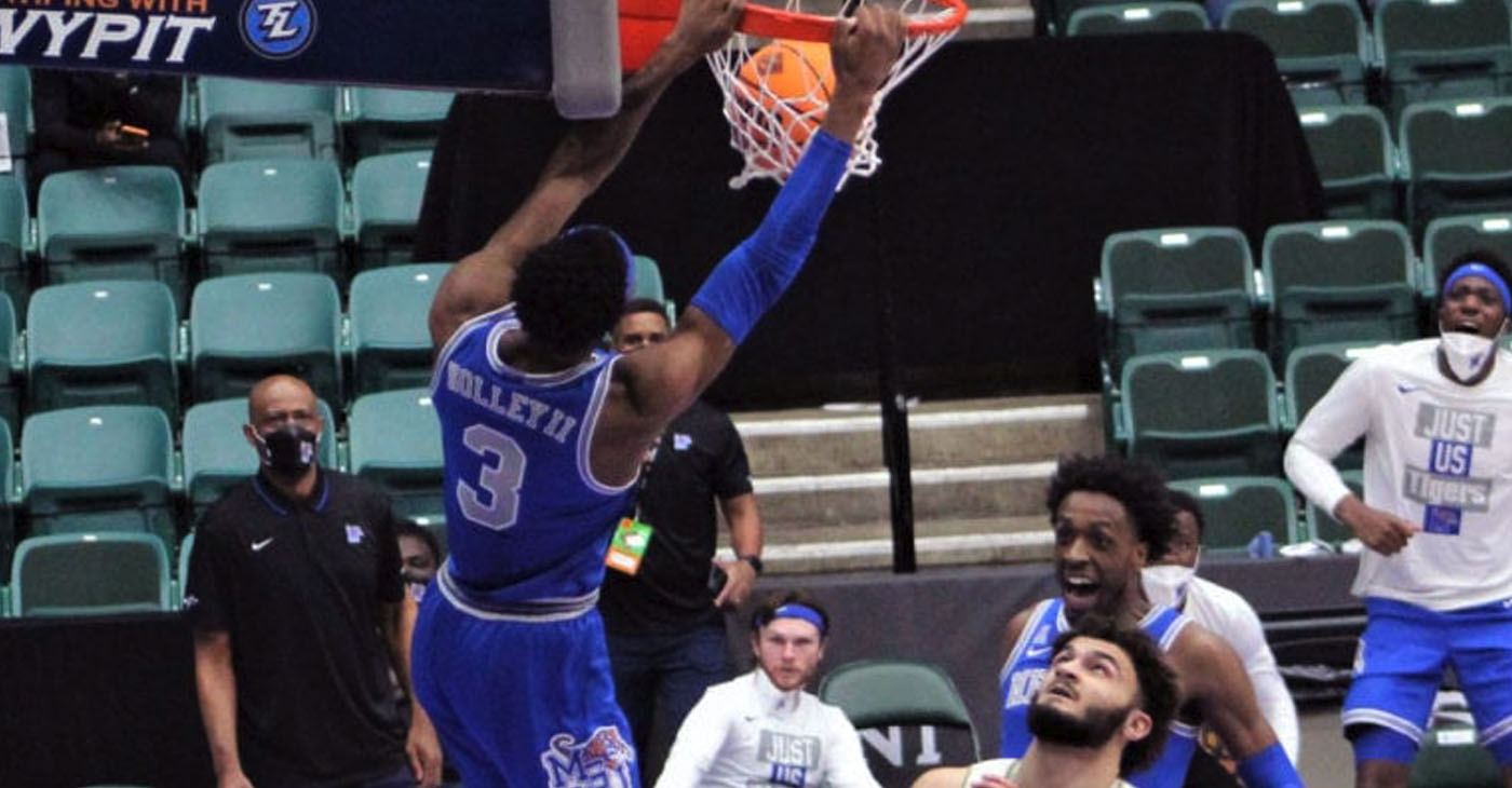 Landers Nolley II exploded for 24 points in the second half, including this dunk, which fired up the Tigers. (Photo: Terry Davis)