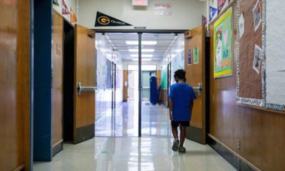 A student walks through Laurel Elementary in Oakland on June 11, 2021. Photo by Anne Wernikoff, CalMatters