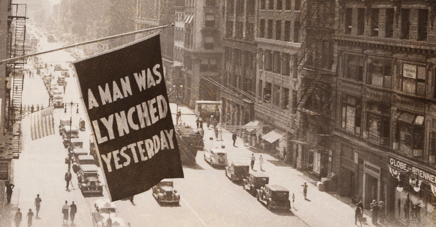 The series showcases compelling narratives of those impacted by newspaper accounts, including the 1908 case of Annie Walker, who begged “night riders” for mercy before she was killed, according to a report in the Public Ledger newspaper in Kentucky. (Photo: Flag announcing another lynching. "A MAN WAS LYNCHED YESTERDAY," is flown from the window of the NAACP headquarters on 69 Fifth Ave., New York City in 1936. (Everett Collection/Shutterstock))