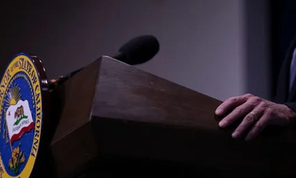 A closeup of the podium where Gov. Gavin Newsom presented his budget breakdown in Sacramento on May 14, 2021. Photo by Anne Wernikoff, CalMatters
