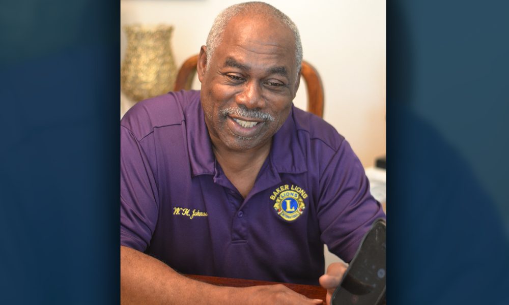 Bill Johnson, a retired Zachary police captain, talks by phone to his newly found daughter, Zindy Laursen, Thursday, December 16, 2021. Laursen, a Danish entertainer, has spent 30 years trying to find her father and recently found Johnson with the help of a genealogist and 23andMe DNA analysis.