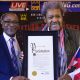 Warren Mayor Doug Franklin presents proclamation to famed boxing promoter Don King on January 22nd at The Grand Resort in Warren, Ohio.
