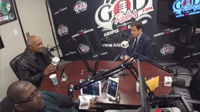 Dr. John Warren, far left, interviews Councilmember Raul Campillo on December 29, 2021 during a G.O.D. Radio1.com broadcast. Photo: VV via Facebook.