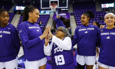 Dr. Opal Lee greets players from the Texas Christian University (TSU) women's basketball team.