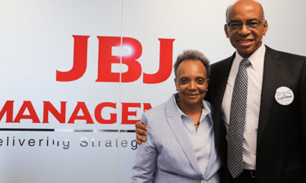 BJ Management CEO Willis Johnson and Chicago Mayor Lori Lightfoot