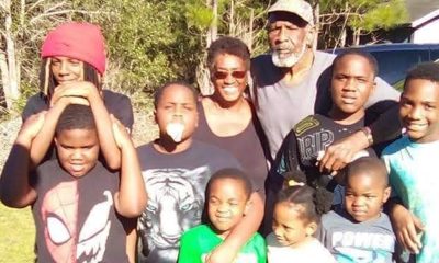 Courtney Hamilton’s six sons and other family, (top from left rear) Camarian, in red hat, Kendall, Kristian, grandparents Betty Hamilton and Curtis Hamilton, Kingston, and their cousin Alex Hamilton, (bottom from left), Kobe, their cousin Kamarah Hamilton, and Kassius, had just finished their annual visit to the grave of their mother where they release six red balloons in her honor. Hamilton was killed in an automobiel accident in 2018. Photo courtesy of the Hamilton family.