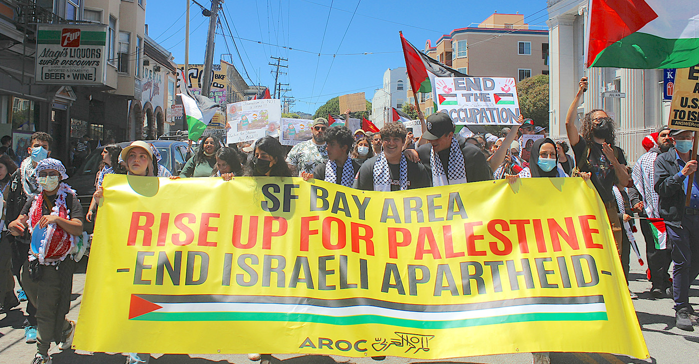Protesters march down 16th Street in San Francisco on May 14 to speak out against the Israeli killing of Palestinian-American journalist Shireen Abu Akleh, 74 years of occupation, and USA support of Israel. Photo by Zack Haber.