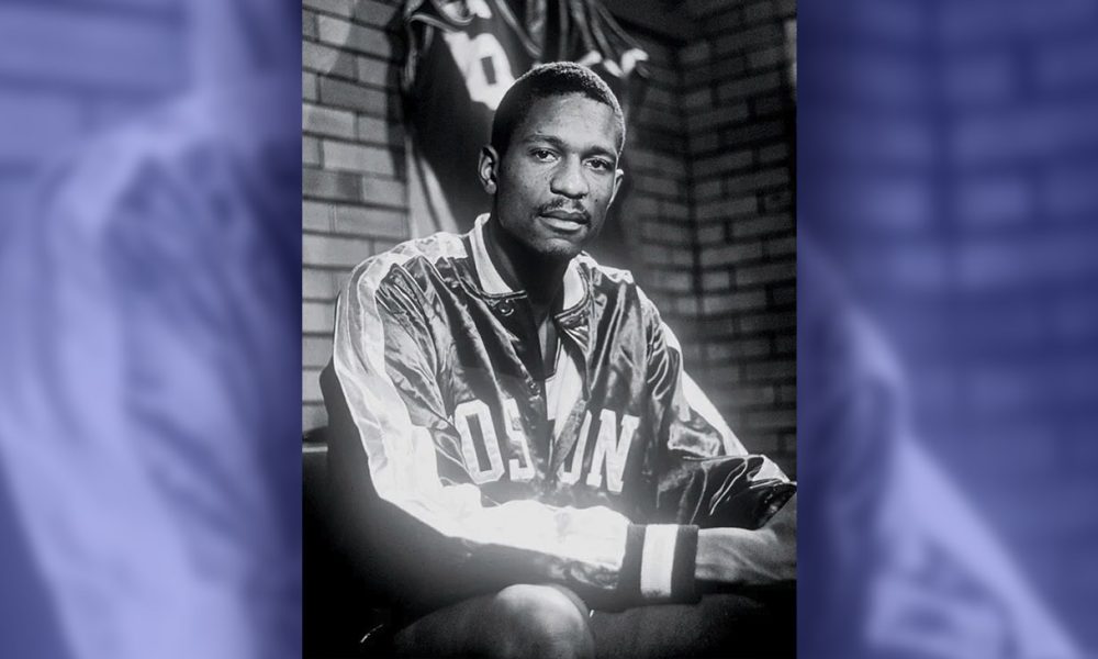Bill Russell wearing a Boston Celtics jacket in 1957 (Photo: John G. Zimmerman for Sports Illustrated / Wikimedia Commons)