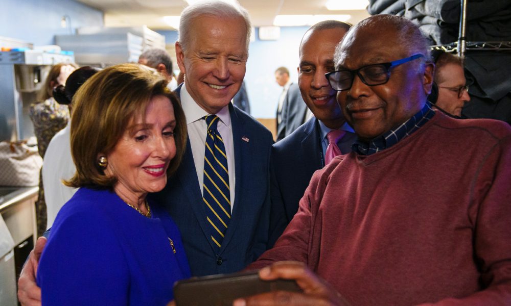 It is refreshing to see President Joe Biden finally getting the credit he deserves for what is one of the most productive starts to a presidential term in recent history. (Photo: President Joe Biden poses for a selfie with Speaker Nancy Pelosi (Calif.), Chairman of the House Democratic Caucus Hakeem Jeffries (N.Y.) and Majority Whip Jim Clyburn (S.C.) before delivering remarks at the House Democratic Caucus Issues Conference, Friday, March 11, 2022, at the Hilton Philadelphia Penn’s Landing in Philadelphia. (Official White House Photo by Adam Schultz)