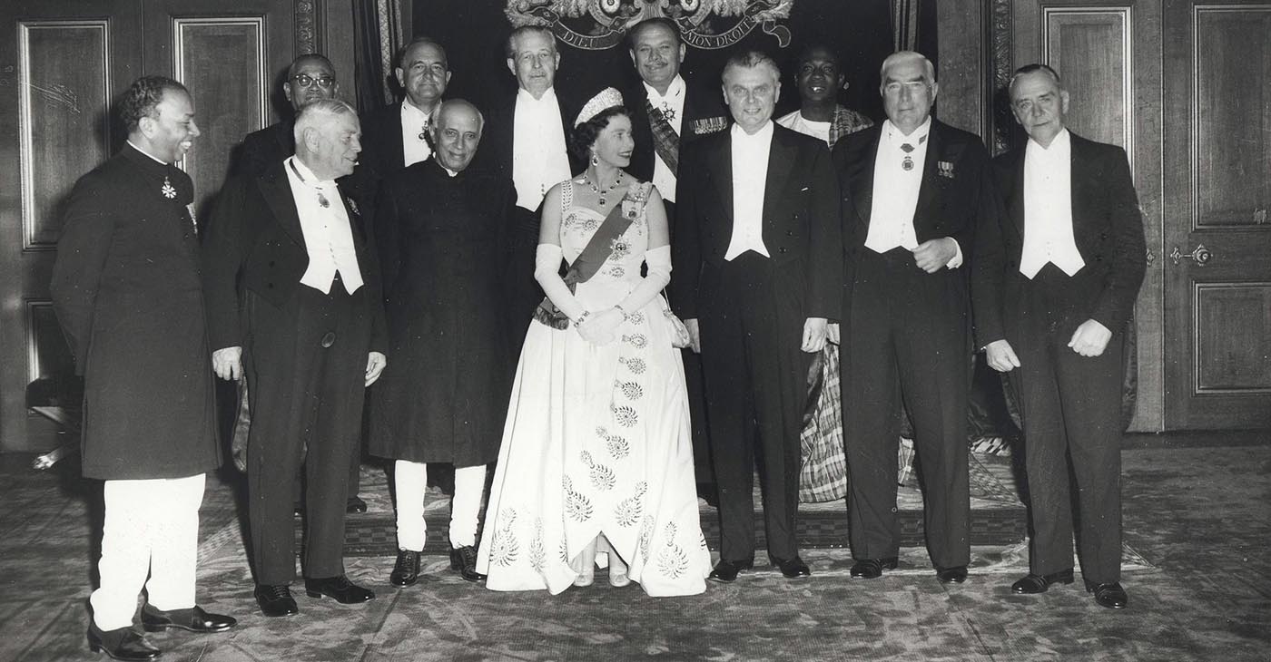 Photograph of Queen Elizabeth II and Commonwealth leaders, taken at the 1960 Commonwealth Conference, Windsor Castle. Front row: (left to right) E. J. Cooray, Walter Nash, Jawaharlal Nehru, Elizabeth II, John Diefenbaker, Robert Menzies, Eric Louw. Back row: Tunku Abdul Rahman, Roy Welensky, Harold Macmillan, Mohammed Ayub Khan, Kwame Nkrumah — May 1960 — (Photo: John G. Diefenbaker Centre, Saskatoon, Canada / British Government)