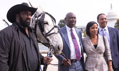 Ben Crump (second from left) on Wednesday, October 12, announced a class action suit against the United States government on behalf of the National Black Farmers Association.