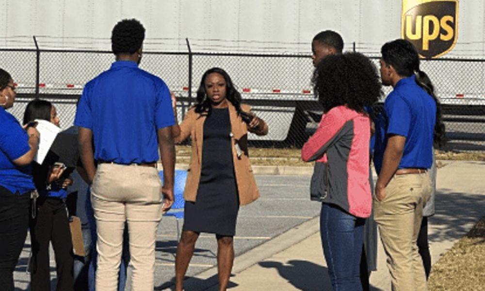 UPS Human Resource Business Partner Director Bria Woods (center) instructs staffers before the career fair Friday morning. Photo by Donnell Suggs/The Atlanta Voice
