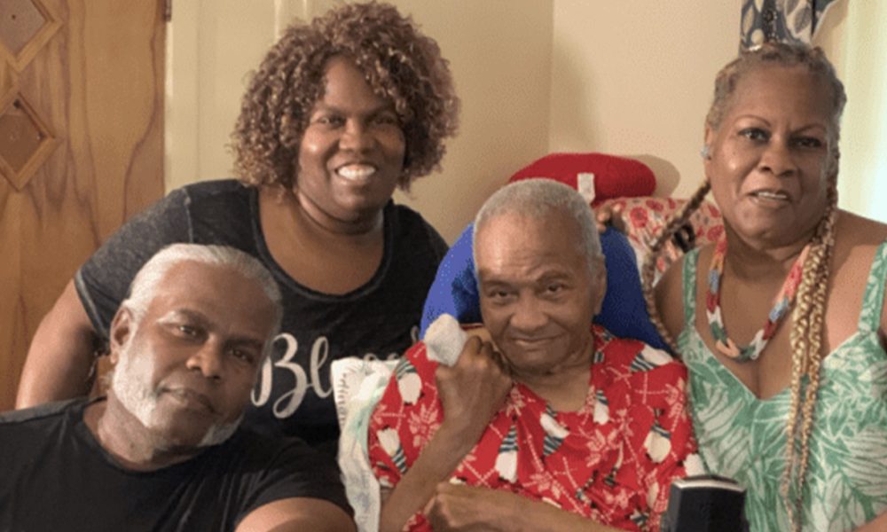 Three of Sarah Hughes Johnson’s surviving children – Ned, Karen and Geneva – nestle around her. Not pictured is her daughter Yvonne. (Courtesy photo)