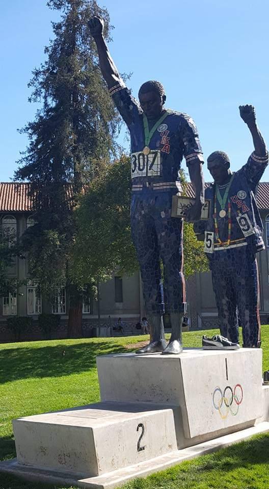 On the morning of Oct. 16, 1968, African American athletes Tommie Smith and John Carlos each raised a black-gloved fist while the U.S. national anthem, “The Star-Spangled Banner,” played during their medal ceremony at the Olympics in Mexico City. CBM photo by Antonio Ray Harvey was taken at their alma mater on Oct.6, 2016 on the campus of San Jose State University. Statue designed by artist Rigo 23 in 2005.