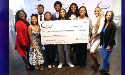 2023 Chevy DTU Fellows at the program closing ceremonies stand with their check.