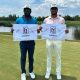Christian Heavens (left) and Quinn Riley display TPC Louisiana pin flags after winning the APGA Two-Man Classic in Avondale (suburban New Orleans) Tuesday afternoon.