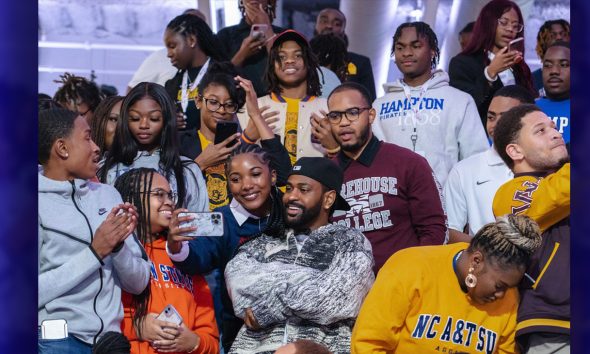 Multi-platinum artist, philanthropist, and entrepreneur Big Sean poses with Moguls in 2022 after sharing his personal experiences and commitment to the program.