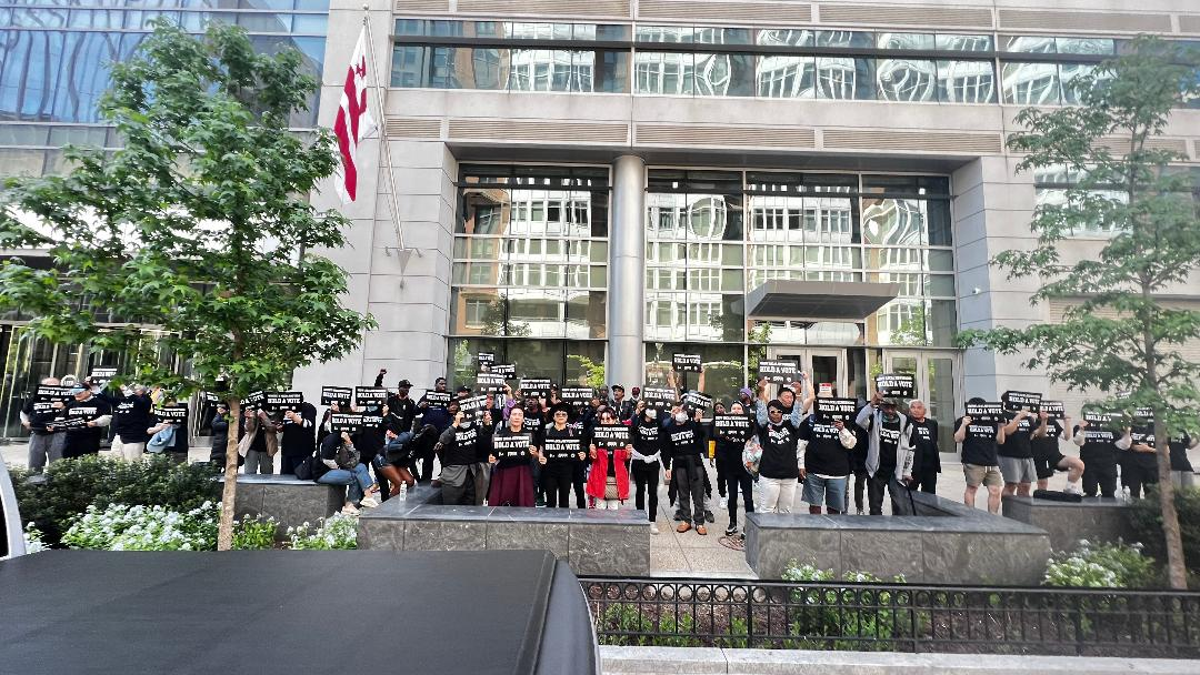 April, Federal Communications Commission Public Hearing. Black and Korean protestors in front of FCC Headquarters, downtown Washington, DC