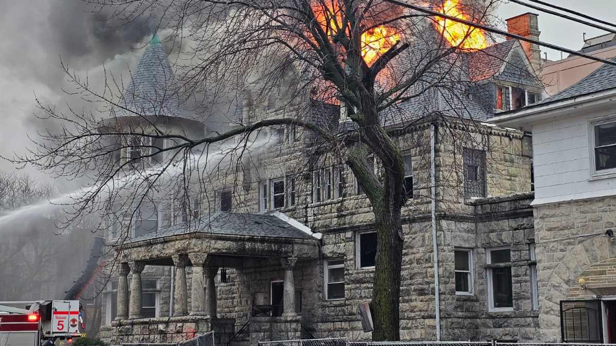 CAPTION: Fire erupts at historic Swift Mansion in Bronzeville on the South Side on Dec. 3 (Photo, Chicago Fire Department).