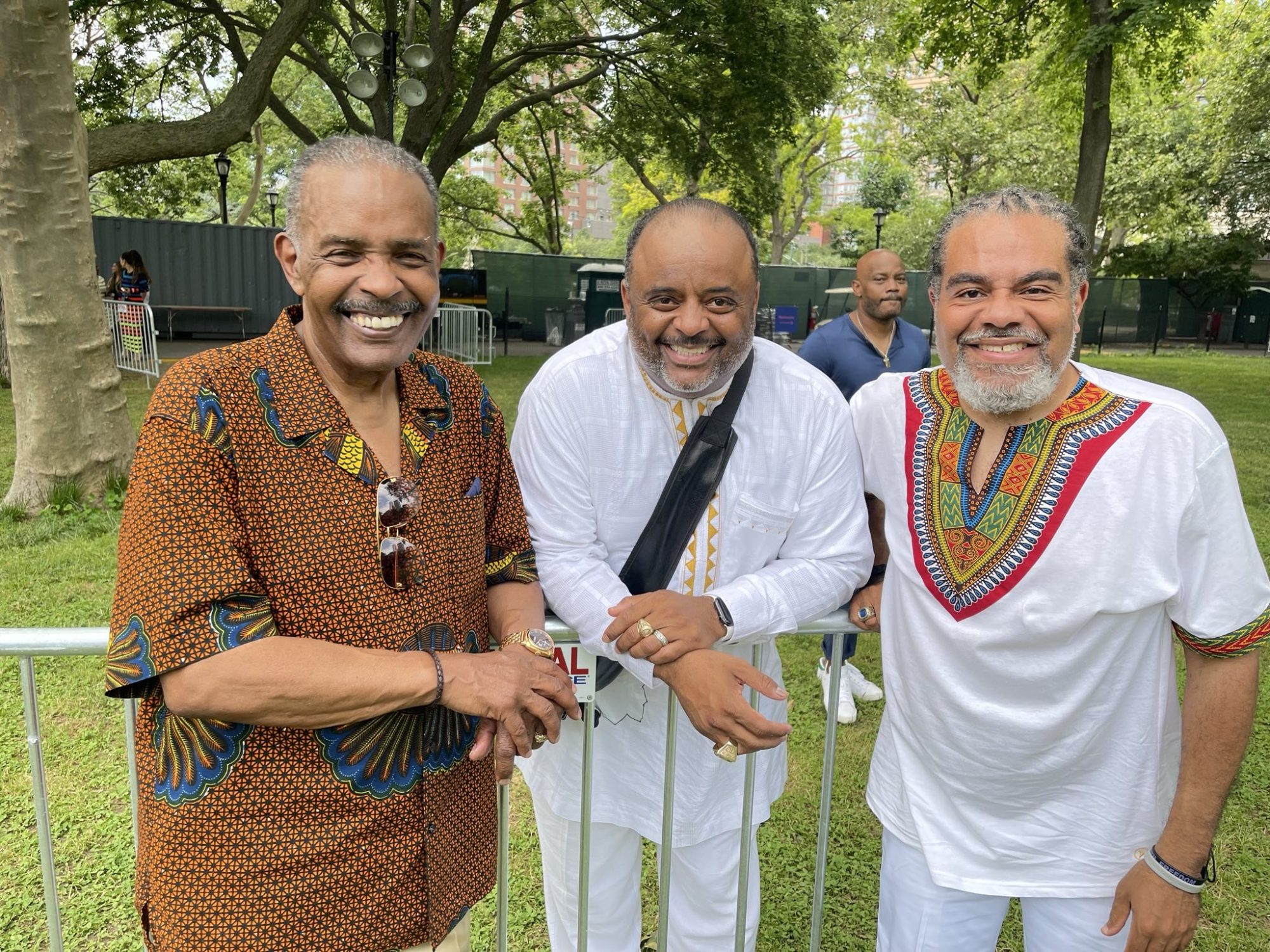 Joe Madison (left), the talk show host, activist and philanthropist known as “The Black Eagle,” shares a happy moment with fellow journalists and activists Roland Martin (center) and Rev. Mark Thompson.