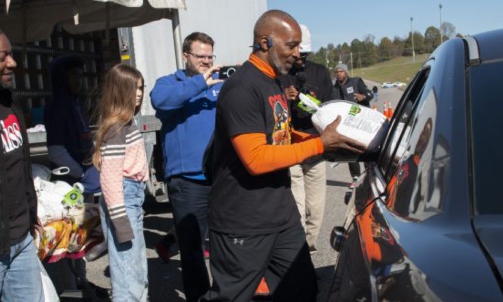 Lane Harper, executive director of the Power of Life Foundation and an officer with the Birmingham Police Department (BPD) during the Foundation’s Fifth Annual Thanksgiving Turkey Giveaway in Fultondale, Alabama. (Marika N. Johnson, For The Birmingham Times)