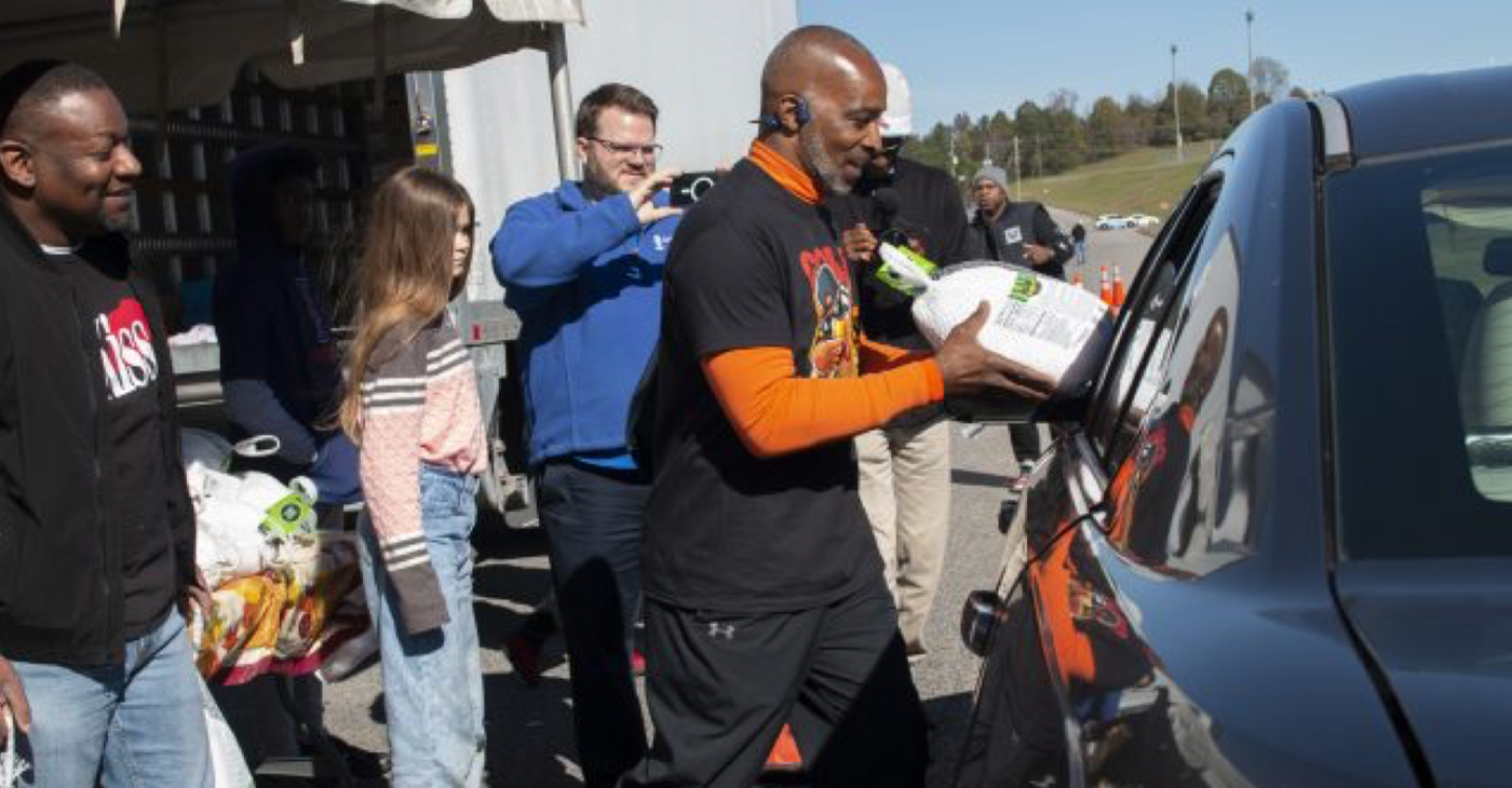 Lane Harper, executive director of the Power of Life Foundation and an officer with the Birmingham Police Department (BPD) during the Foundation’s Fifth Annual Thanksgiving Turkey Giveaway in Fultondale, Alabama. (Marika N. Johnson, For The Birmingham Times)